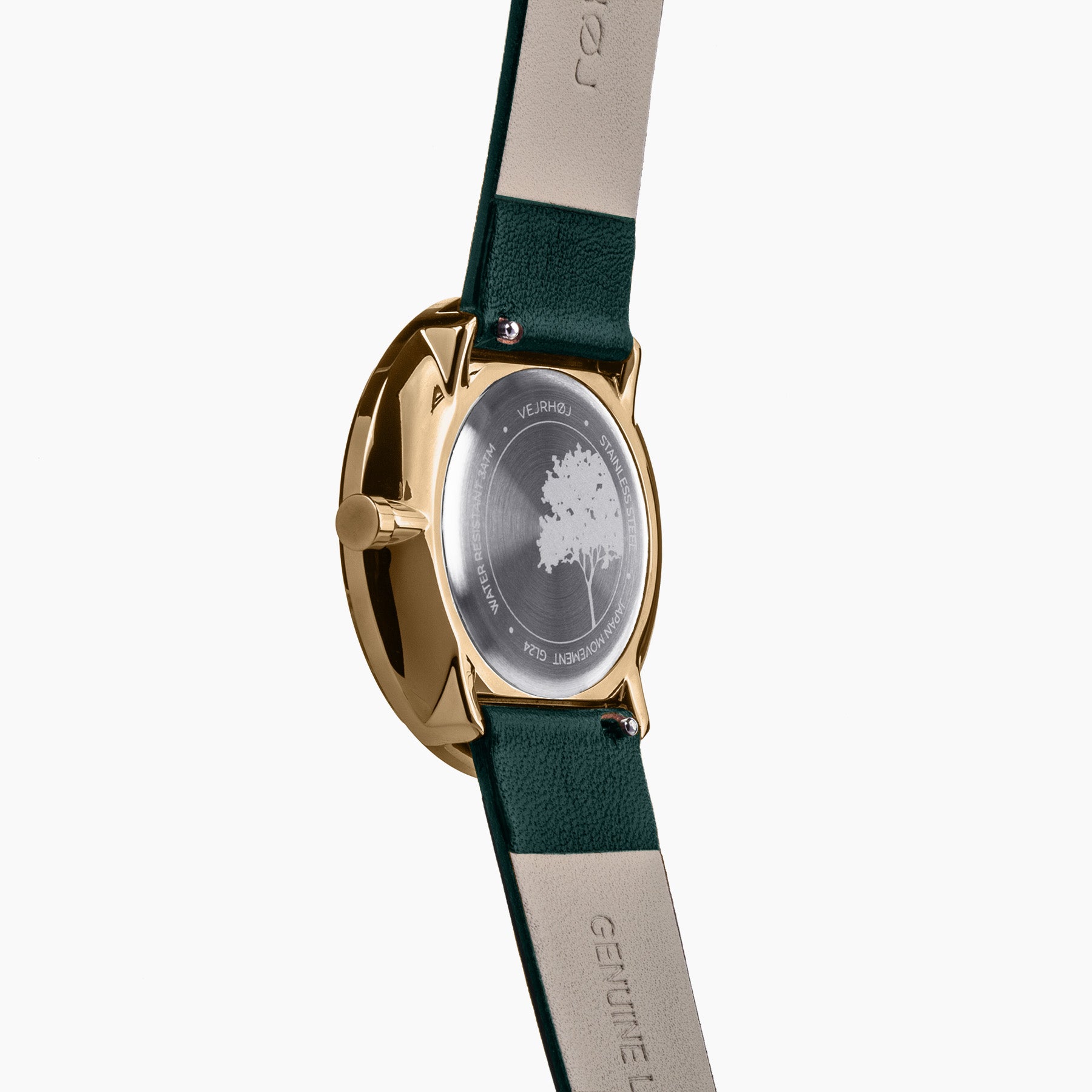 EMERALD The back of a men's green watch and its engraving