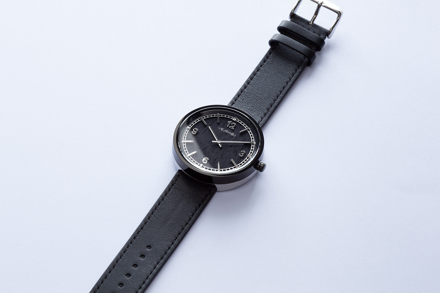 Black and silver wooden watch with numbers from nordic watch company vejrhøj