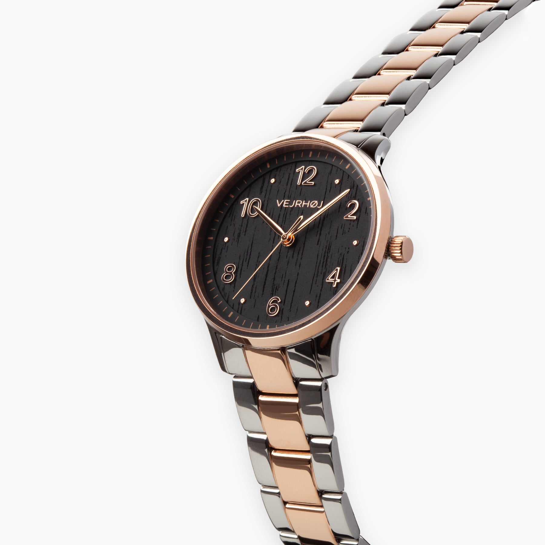 VEJRHØJ's Petite Royal Black Rose, a watch for mature women that blends feminine rose gold with a soothing black dial VEJRHØJ's Petite Royal Black Rose, a rose gold and silver two-tone bracelet with A striking watch with a black wood face