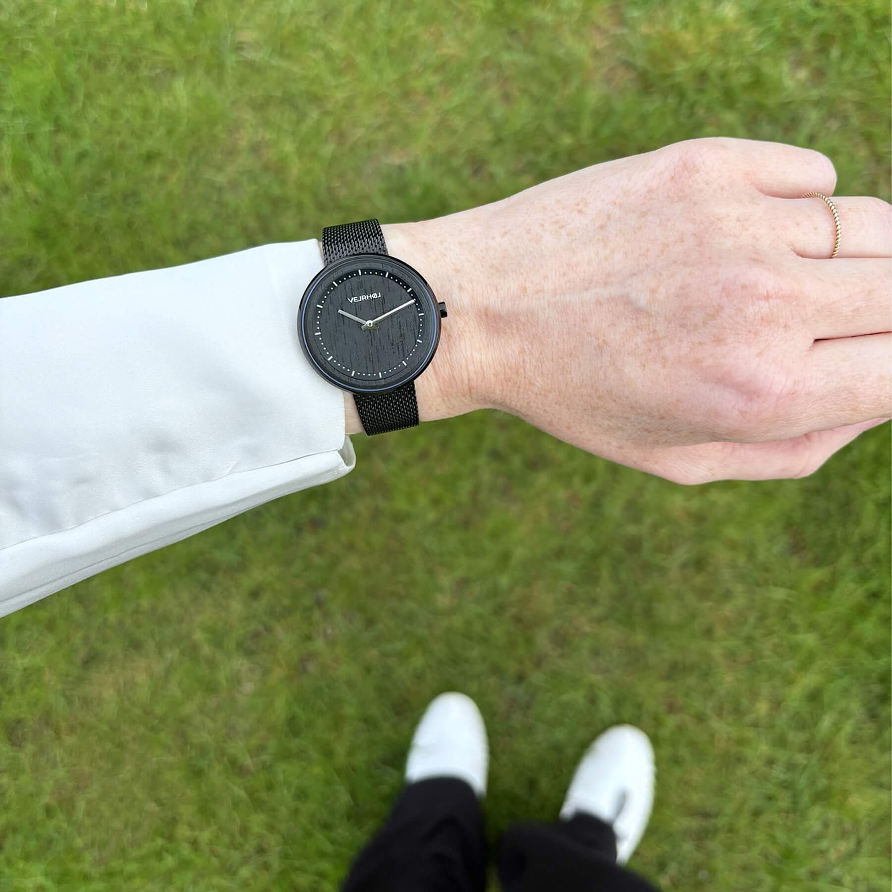 wrist shot of a women's black watch VEJRHØJ 