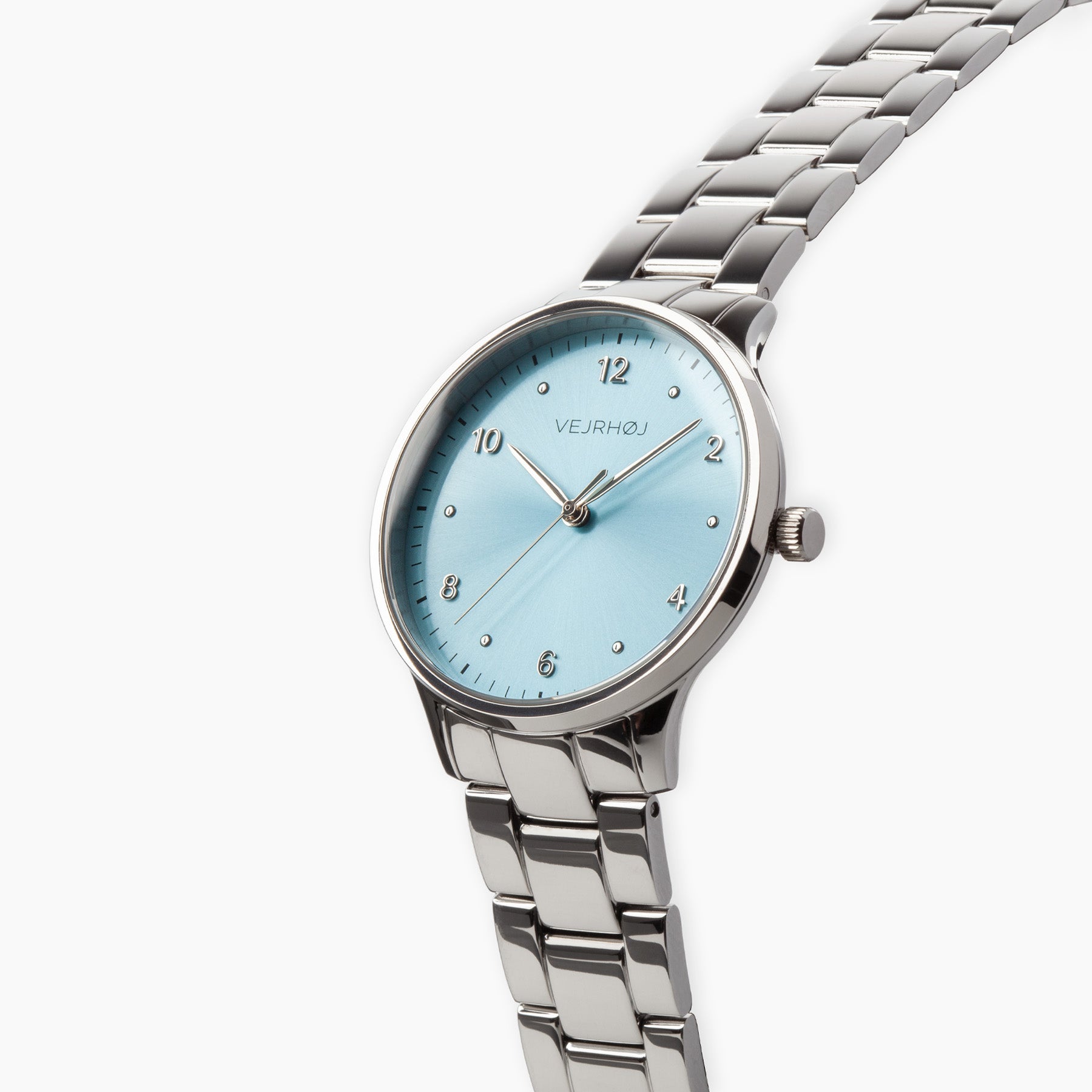 VEJRHØJ's Petite Royal Blue, a beautiful ladies' watch with a blue dial that shines in the light and a minimalist font